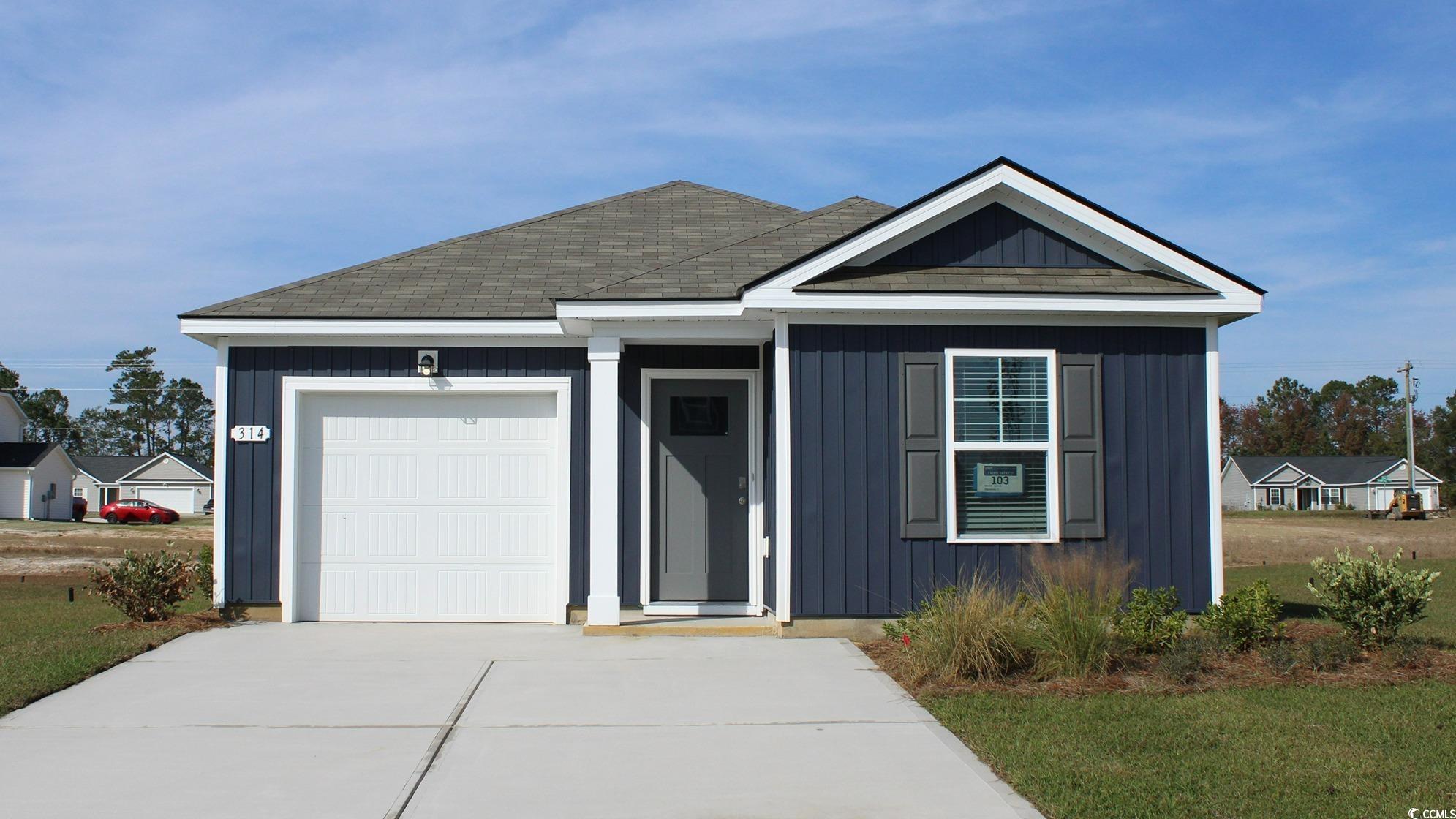 View of front of house featuring a garage