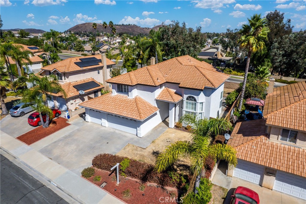 an aerial view of residential houses and outdoor space