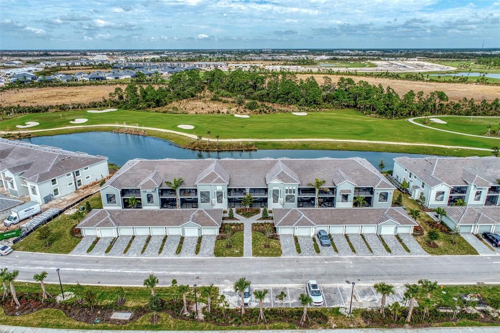 an aerial view of a house with a ocean view