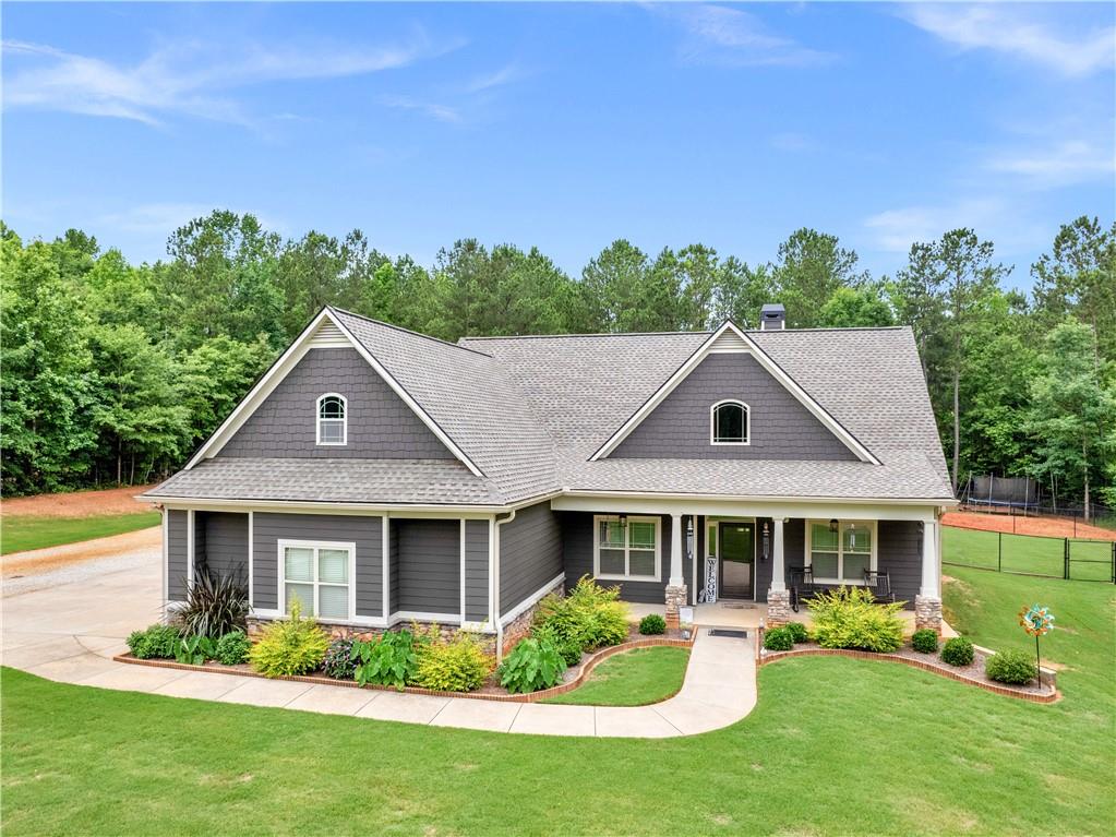 a front view of a house with a yard