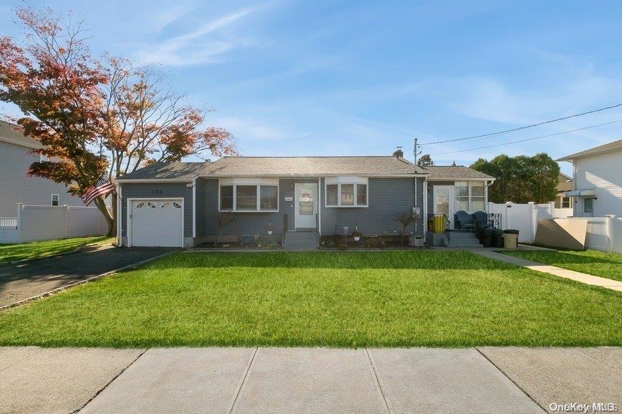 a view of a house with a back yard