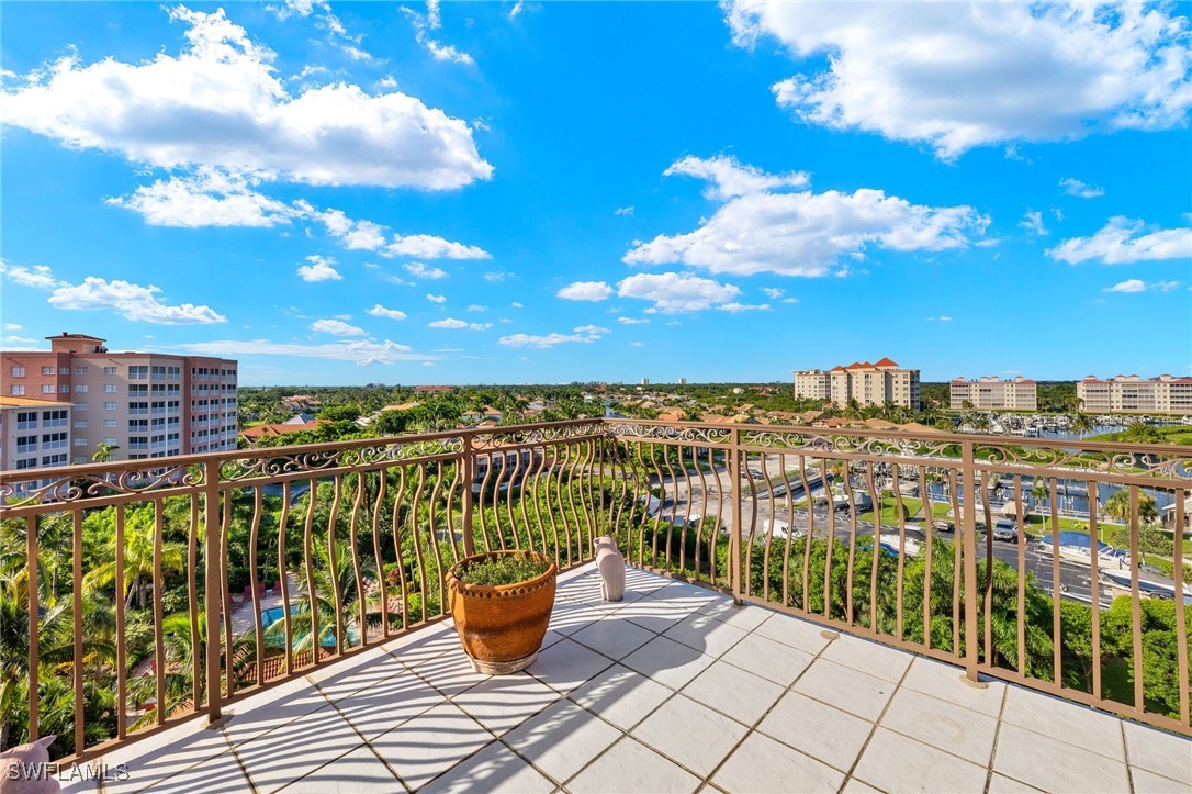 a view of a balcony with city view