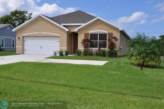 $450,000 | 2257 Southwest Import Drive | Hidden Oaks