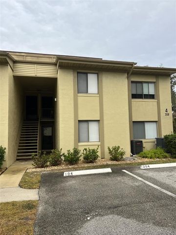 $209,900 | 308 Palm Coast Parkway Northeast, Unit 103 | Downtown Palm Coast