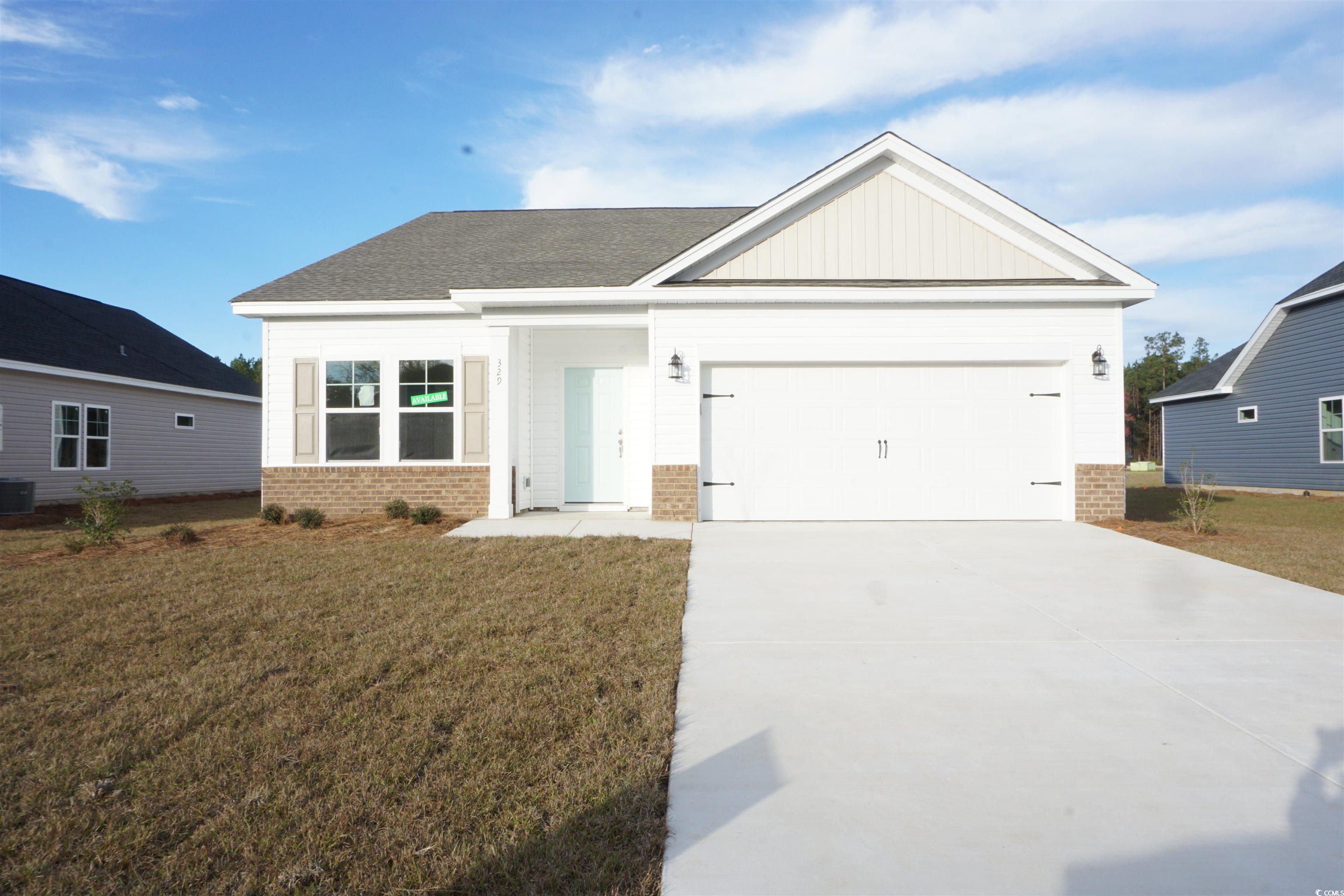 View of front of house featuring central air condi