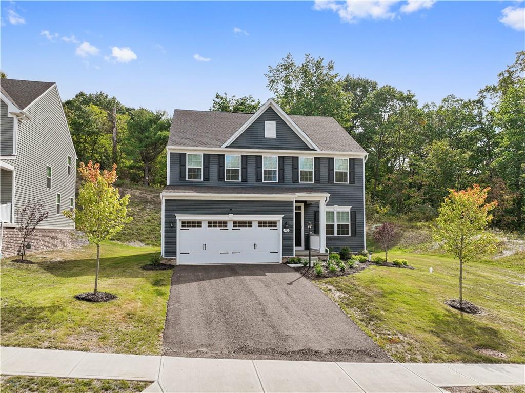 Welcome home to 572 Dogwood Lane in the CanonMac school district...