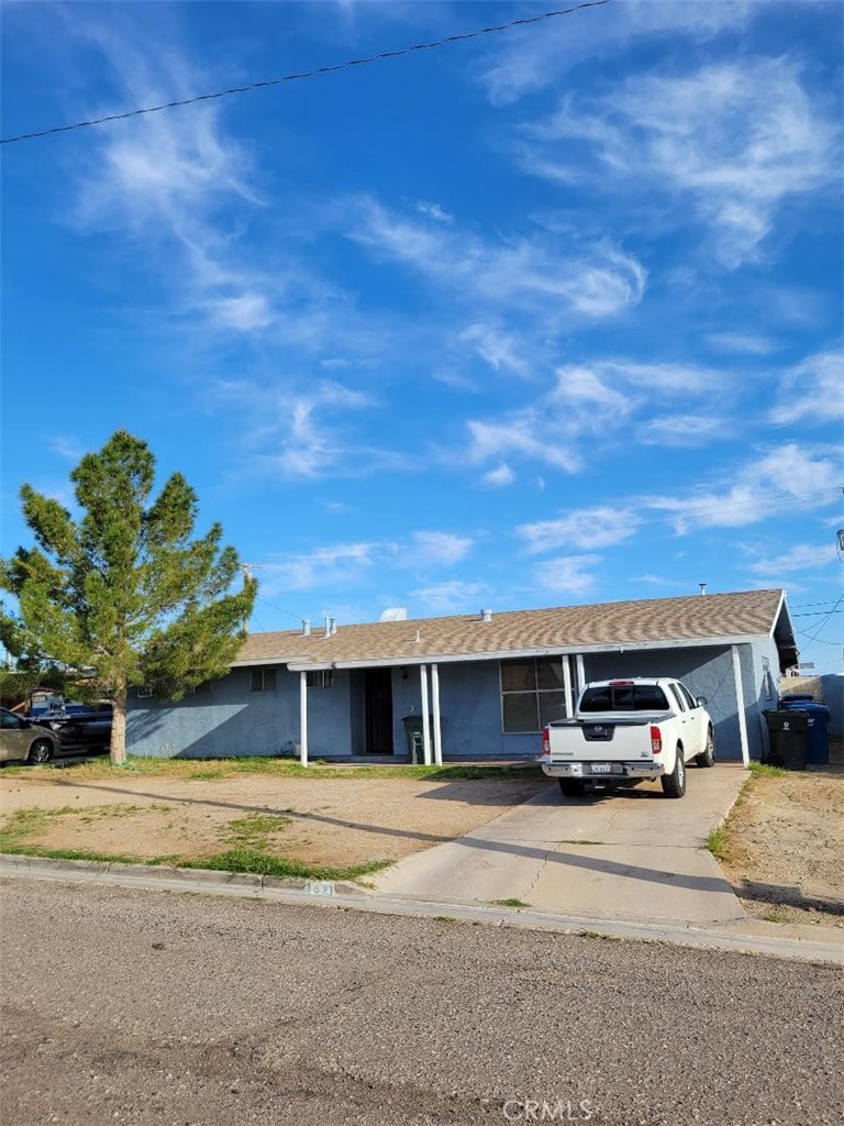 a car parked in front of a house