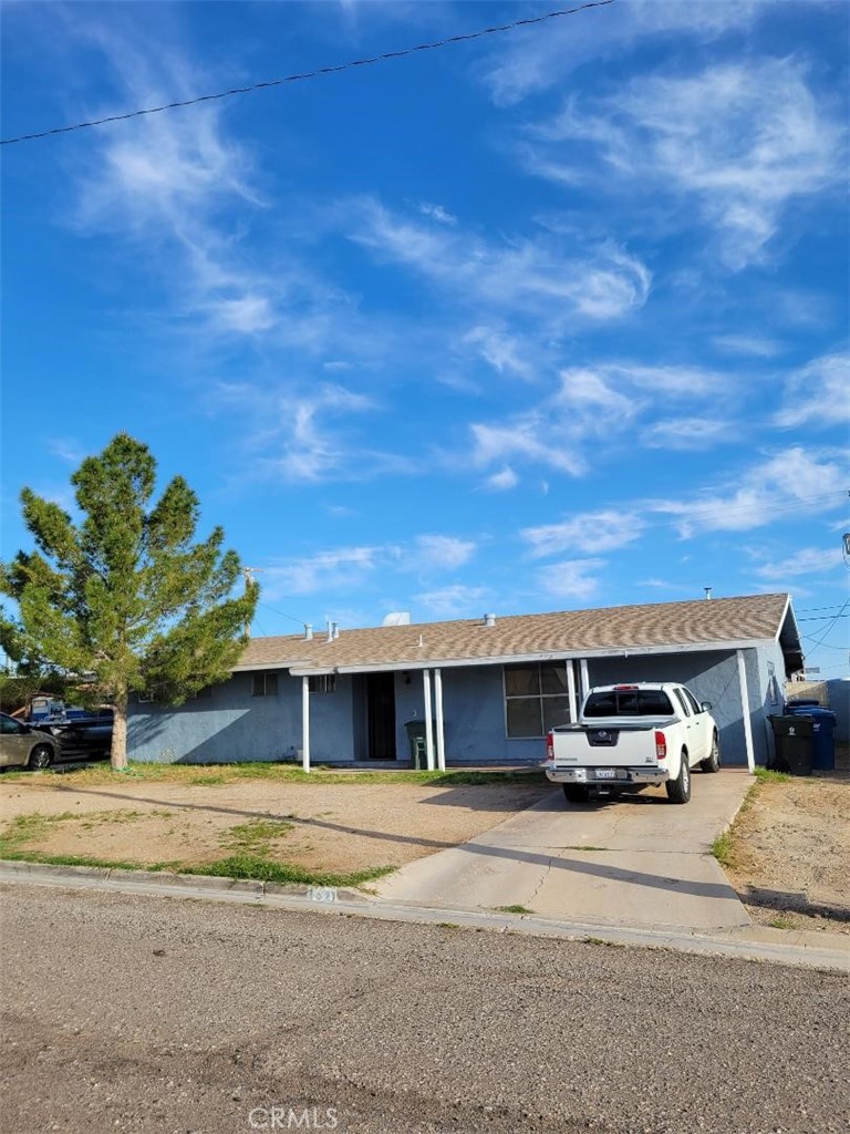 a car parked in front of a house