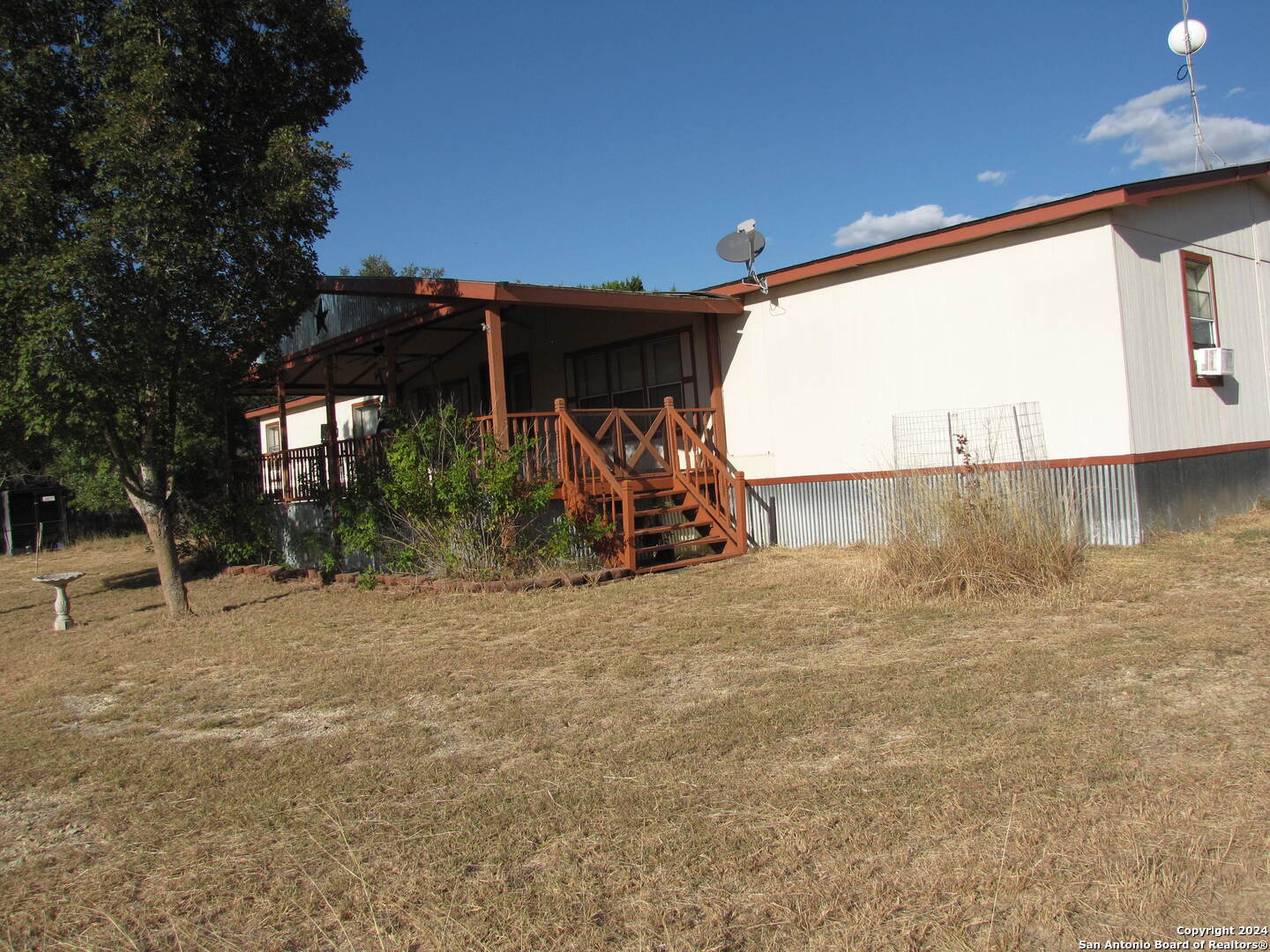 a view of a shaded area in the back yard