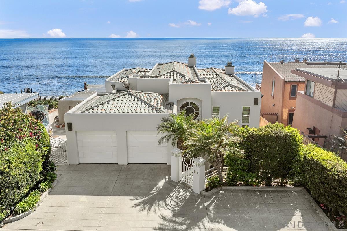 a front view of a house with a garage