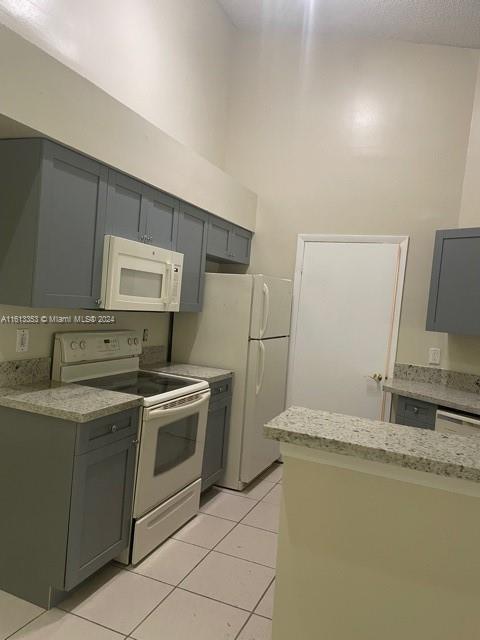 a kitchen with a stove and a sink