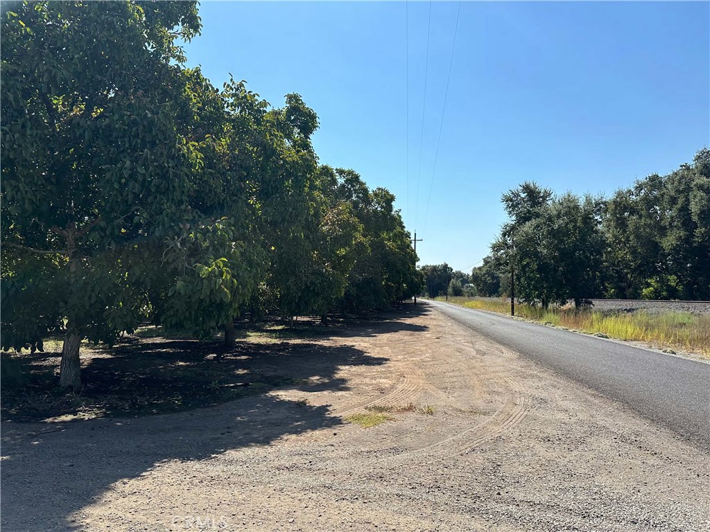 a view of road with trees