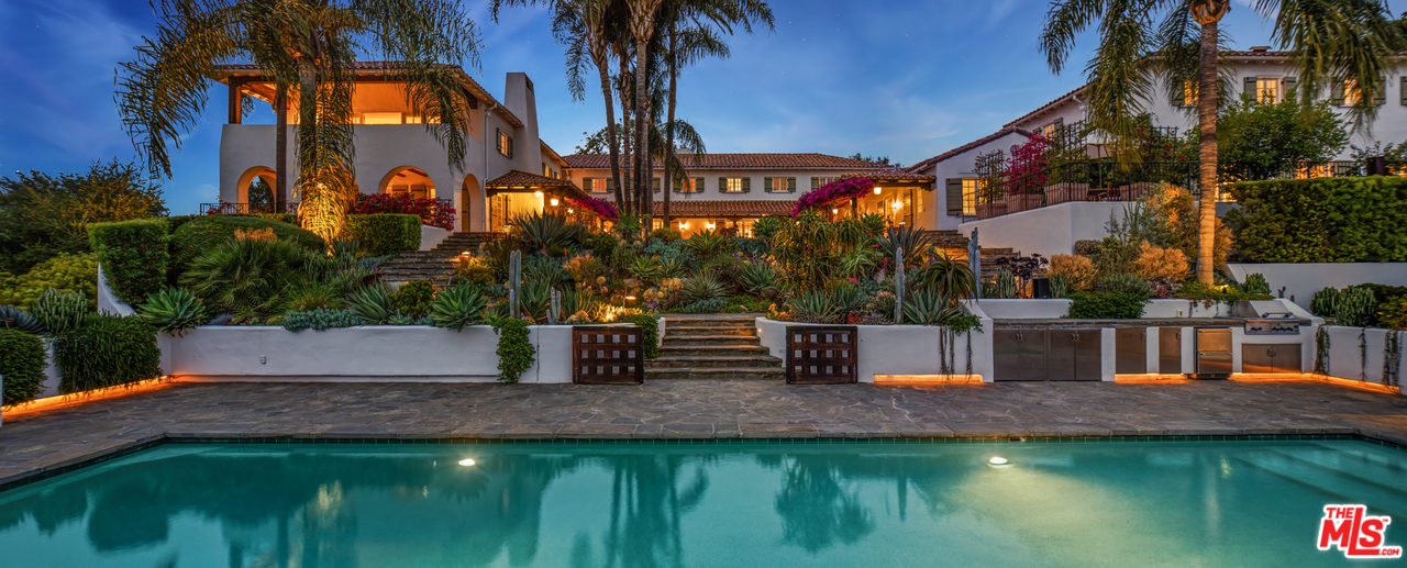 a view of swimming pool with a patio