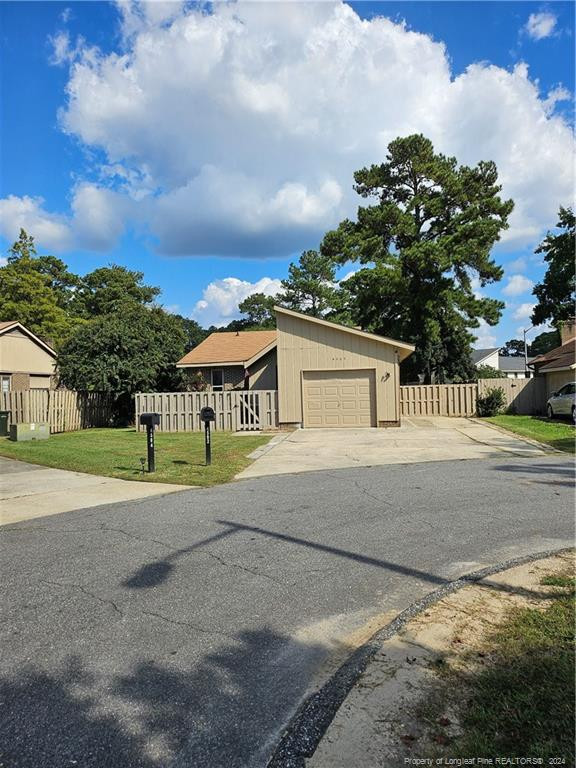 a house with trees in the background