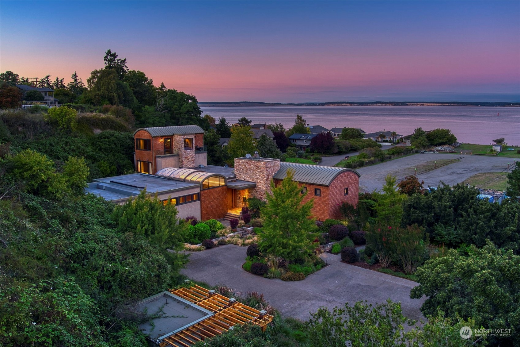 an aerial view of a house with a garden