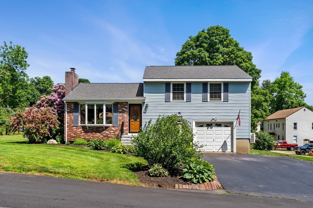 front view of house with a yard