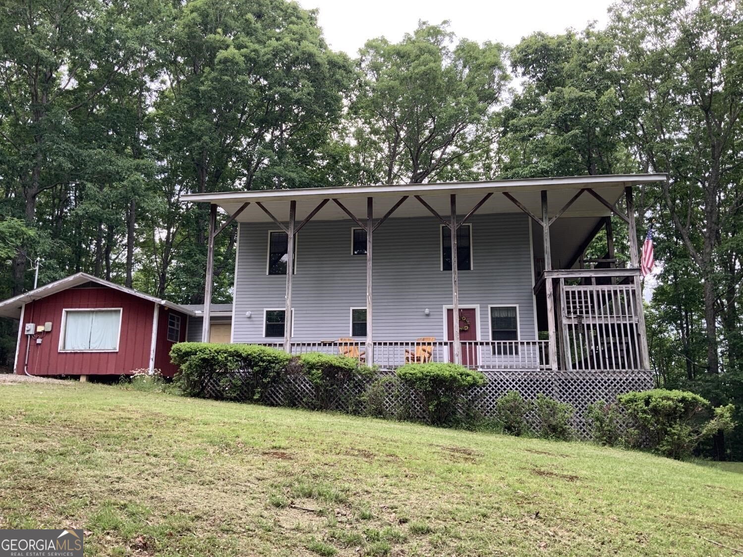 a front view of a house with garden