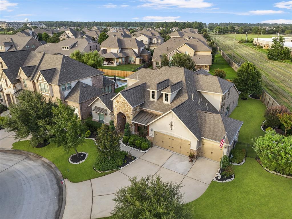 an aerial view of a house with a garden