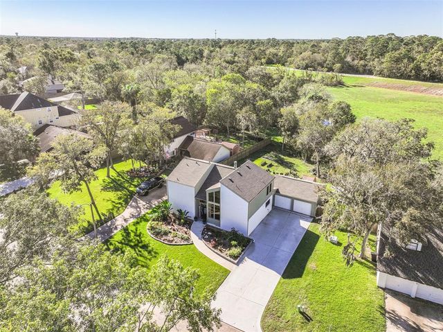 $424,900 | 5238 Whittier Oaks Drive | Friendswood