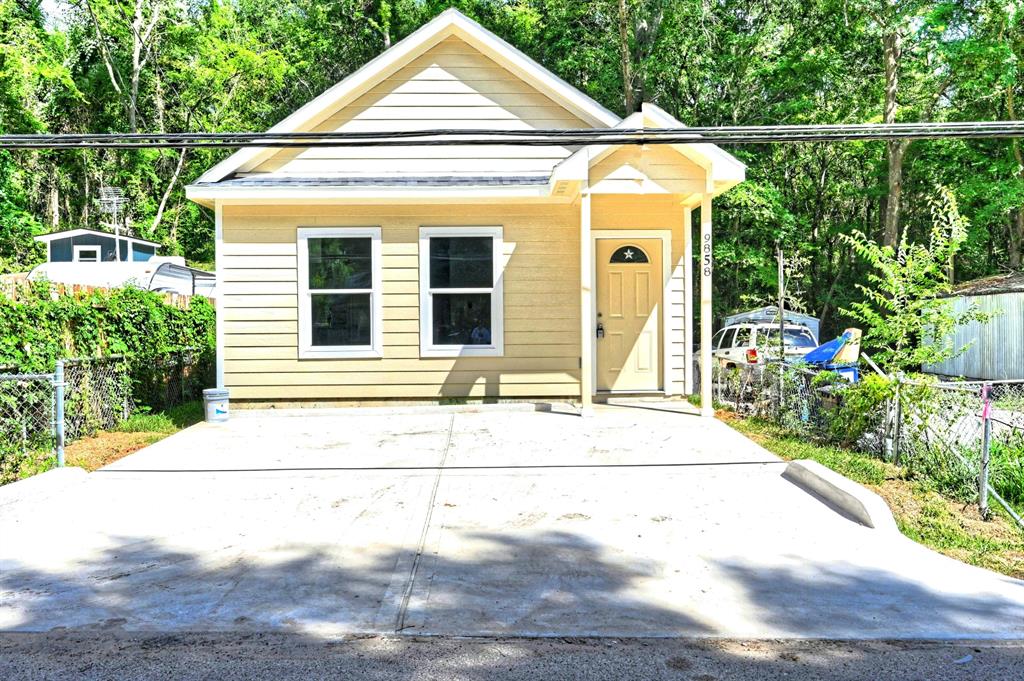 a front view of a house with a porch