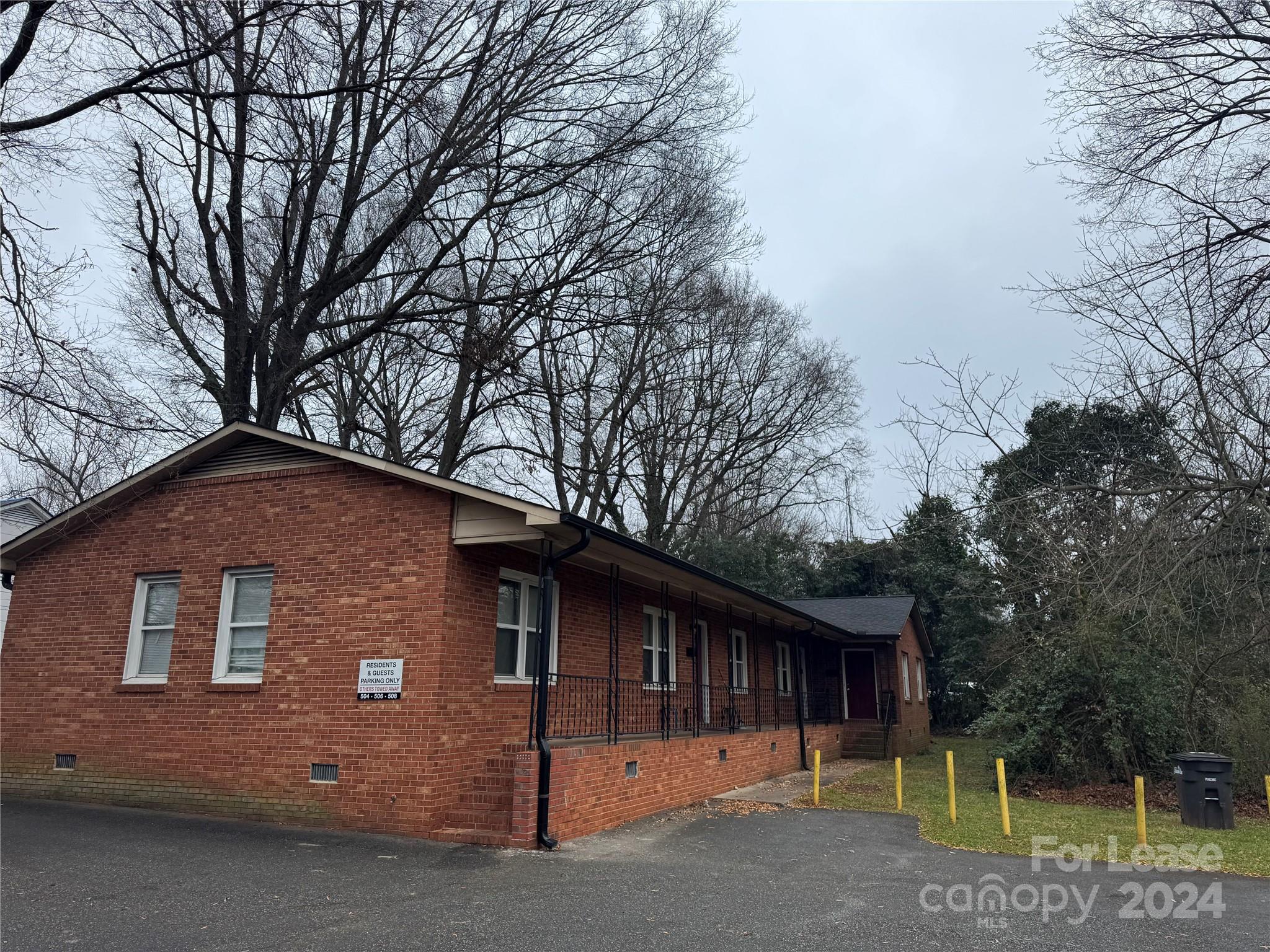 a front view of a house with garage