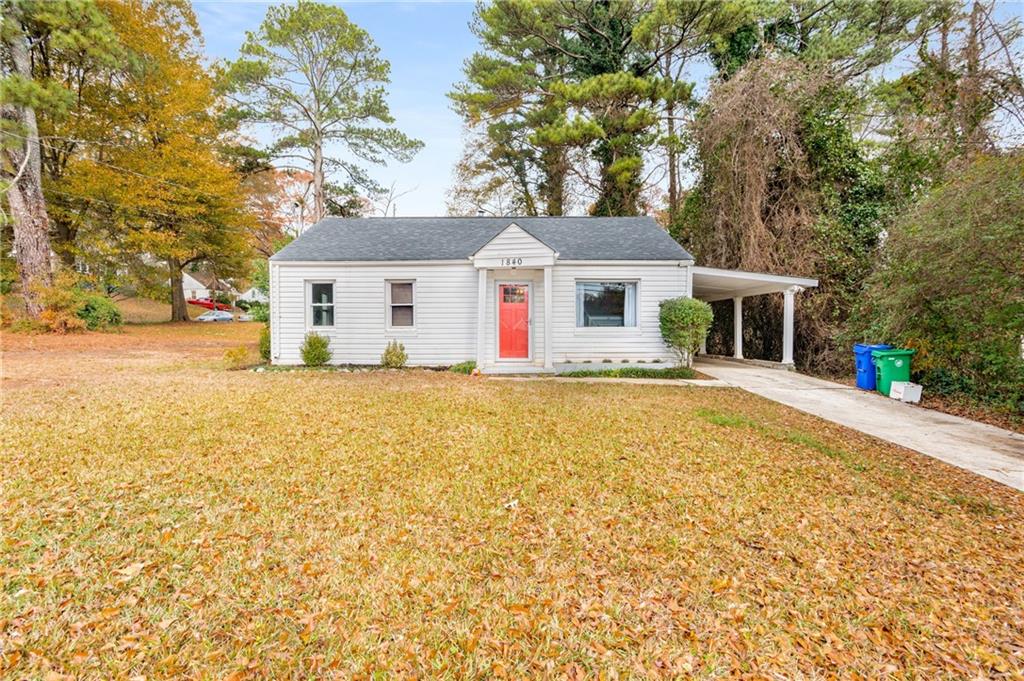 front view of a house with a yard