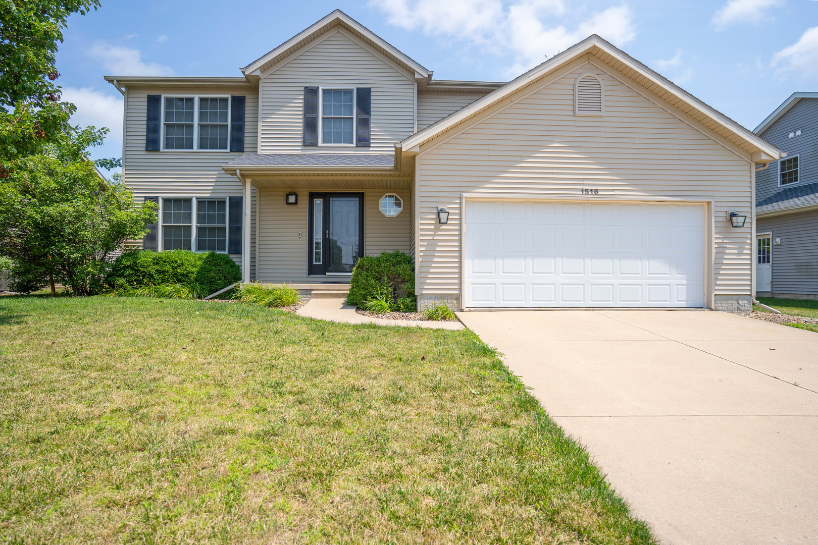 a front view of house with yard