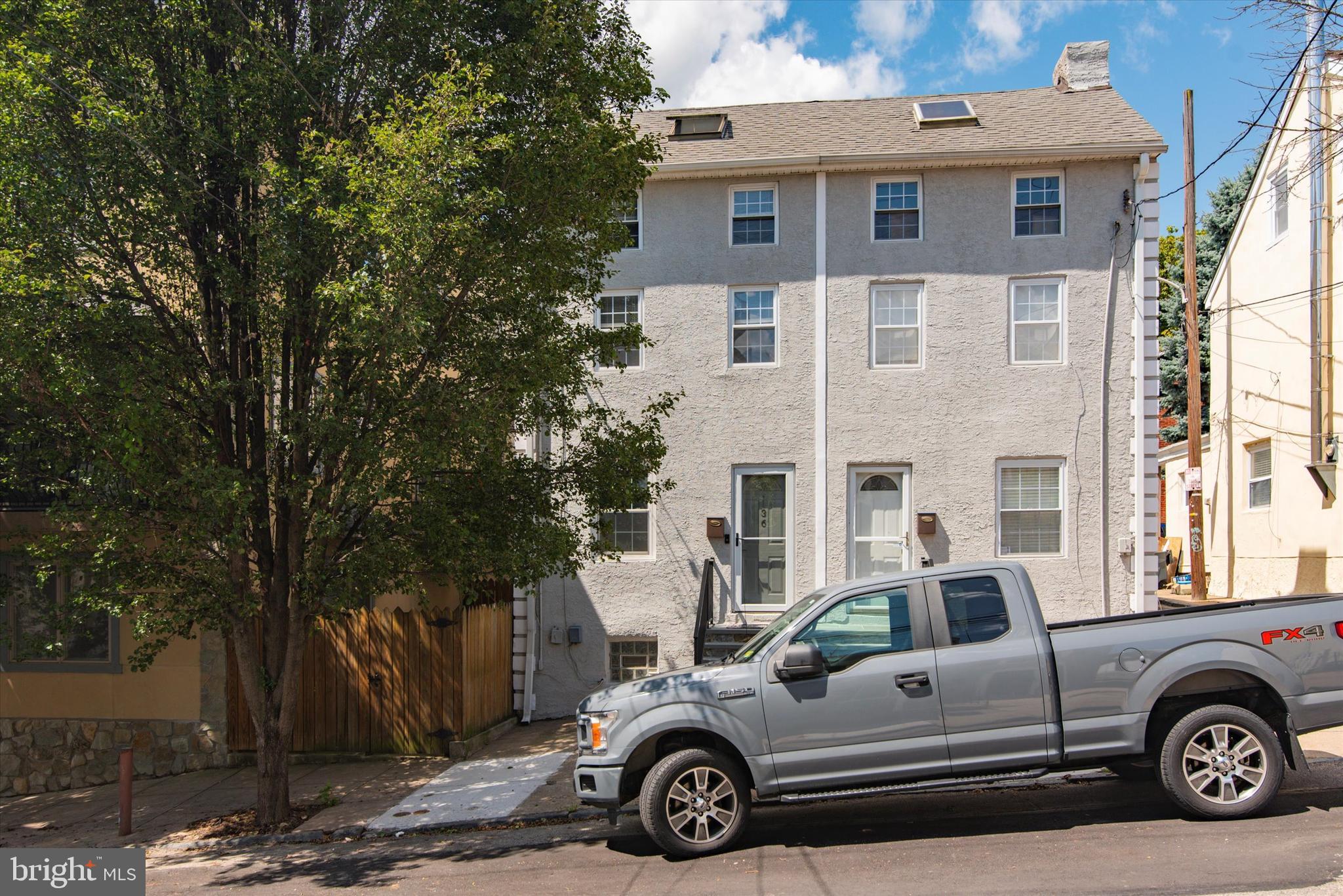 a car parked in front of a house