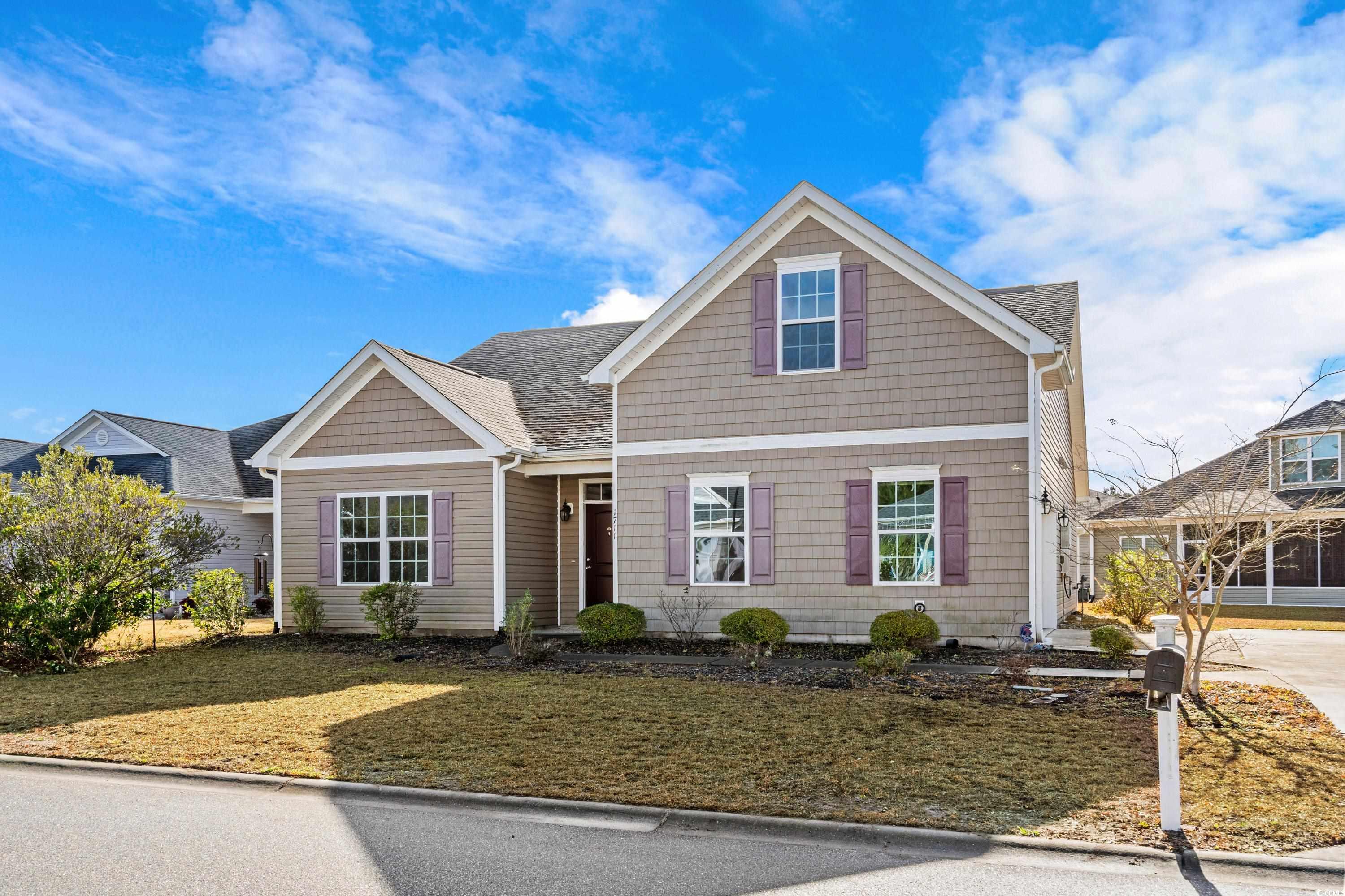 View of front of home with a front lawn