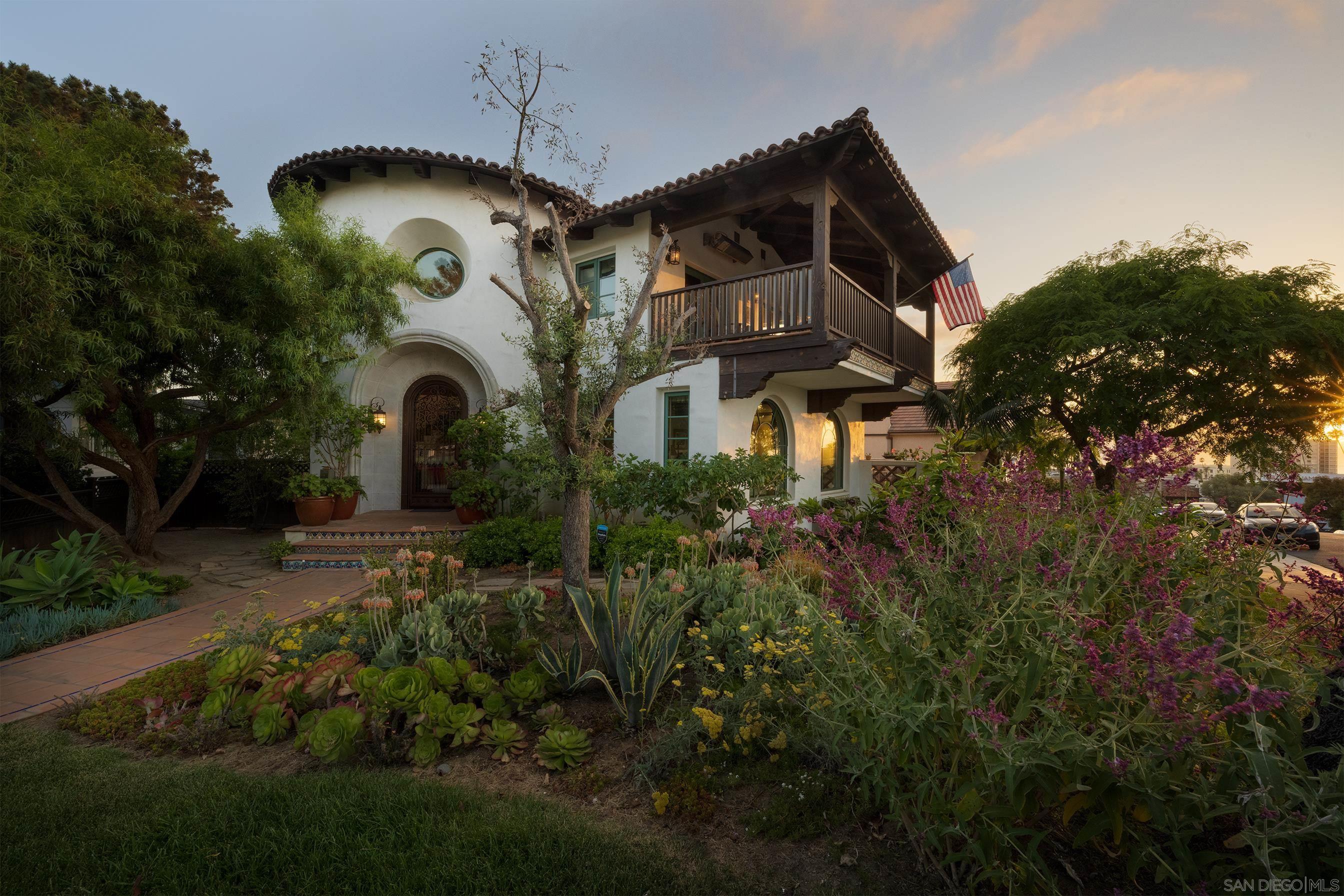 a view of a house with a tree