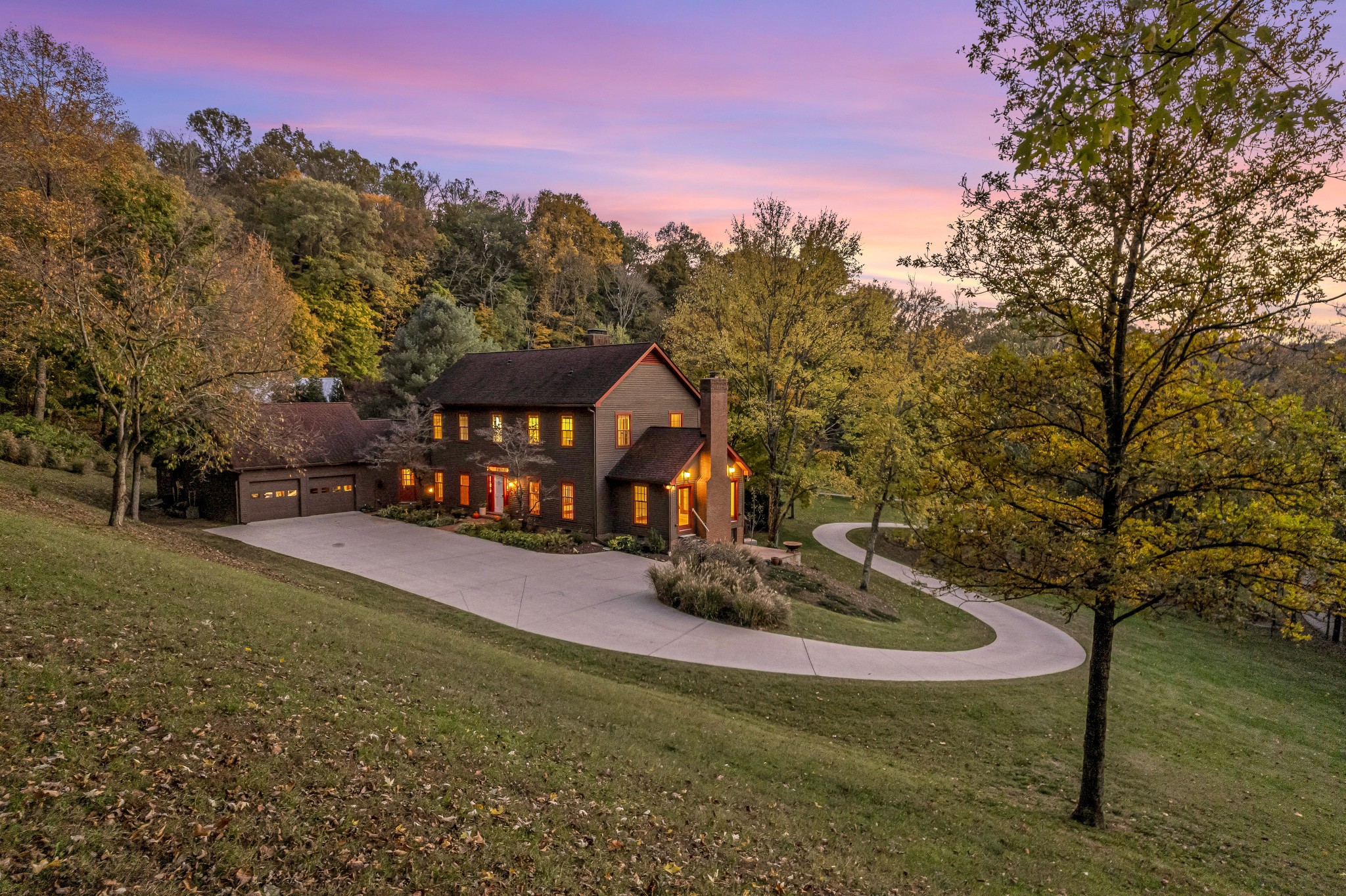 Welcome to 6536 Hidden Hollow Trail, a beautiful home located high on 5.6 acres at the end of a long, winding driveway in Brentwood, TN.