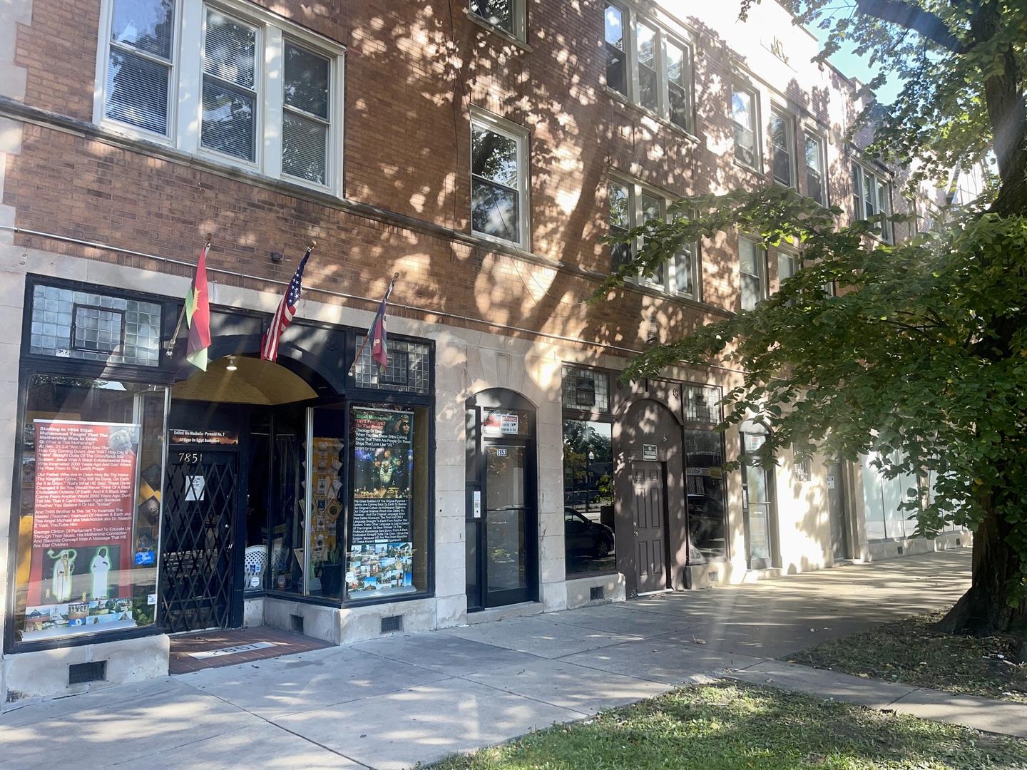 a front view of a building with street view