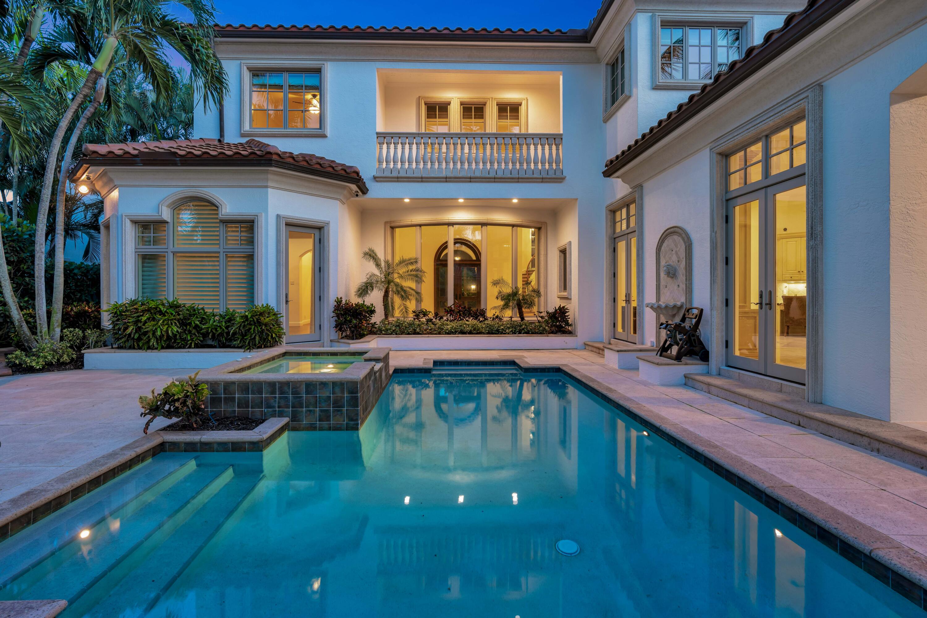 a view of a house with a swimming pool