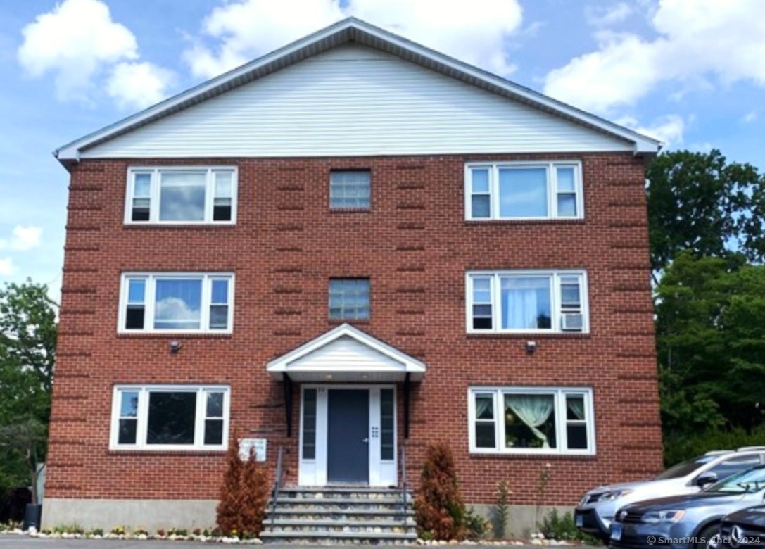 a front view of a house with balcony