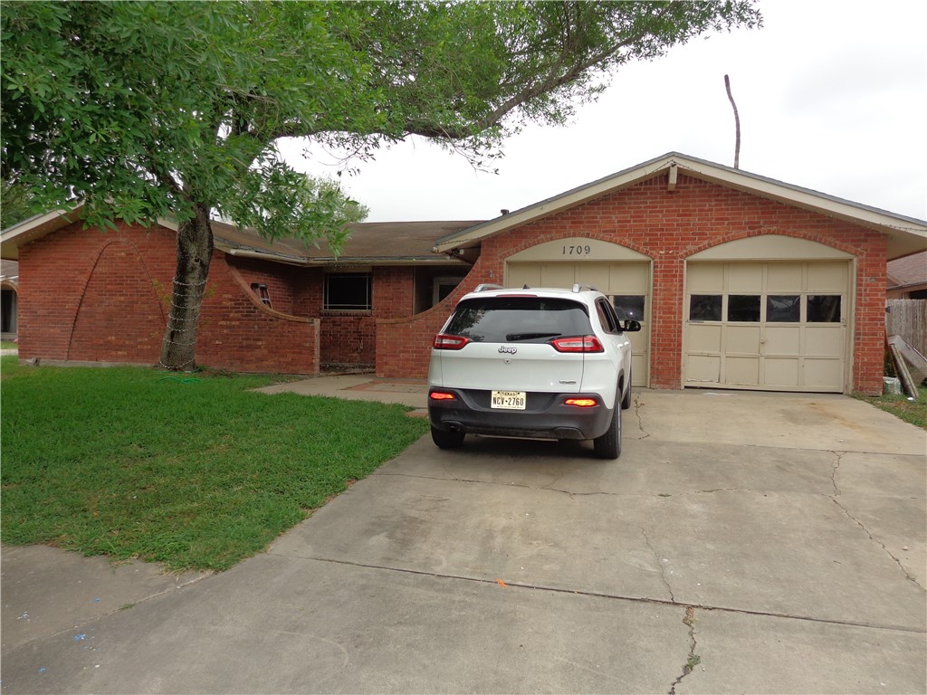 a car parked in front of a house