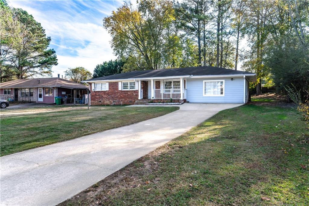 front view of a house with a yard