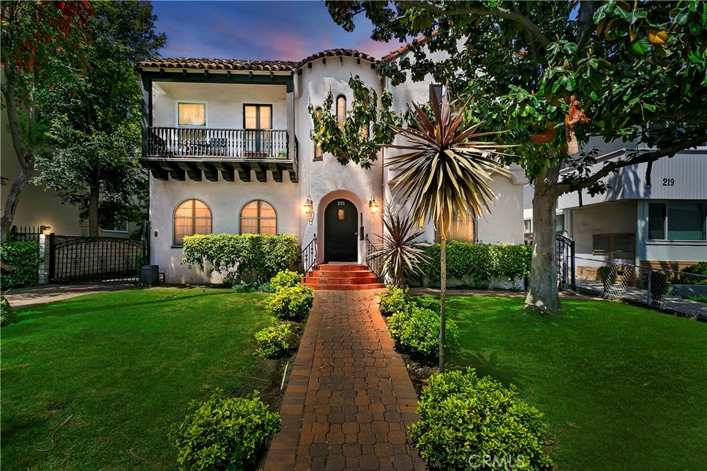 a view of a house with a garden