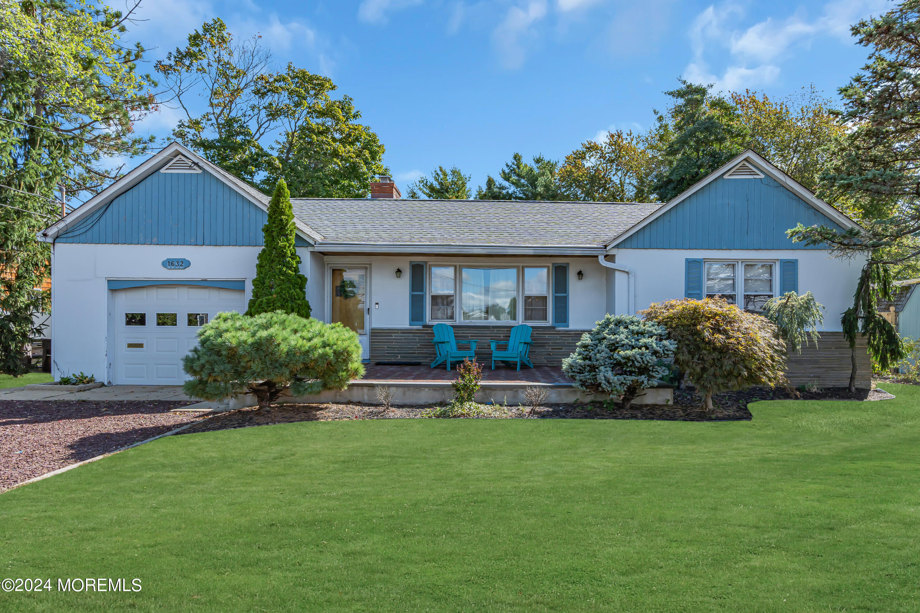 a house view with a garden space