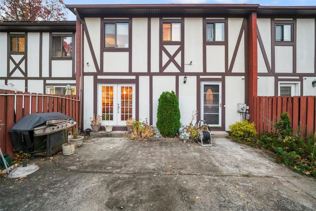 Rear view of property with french doors and a patio area