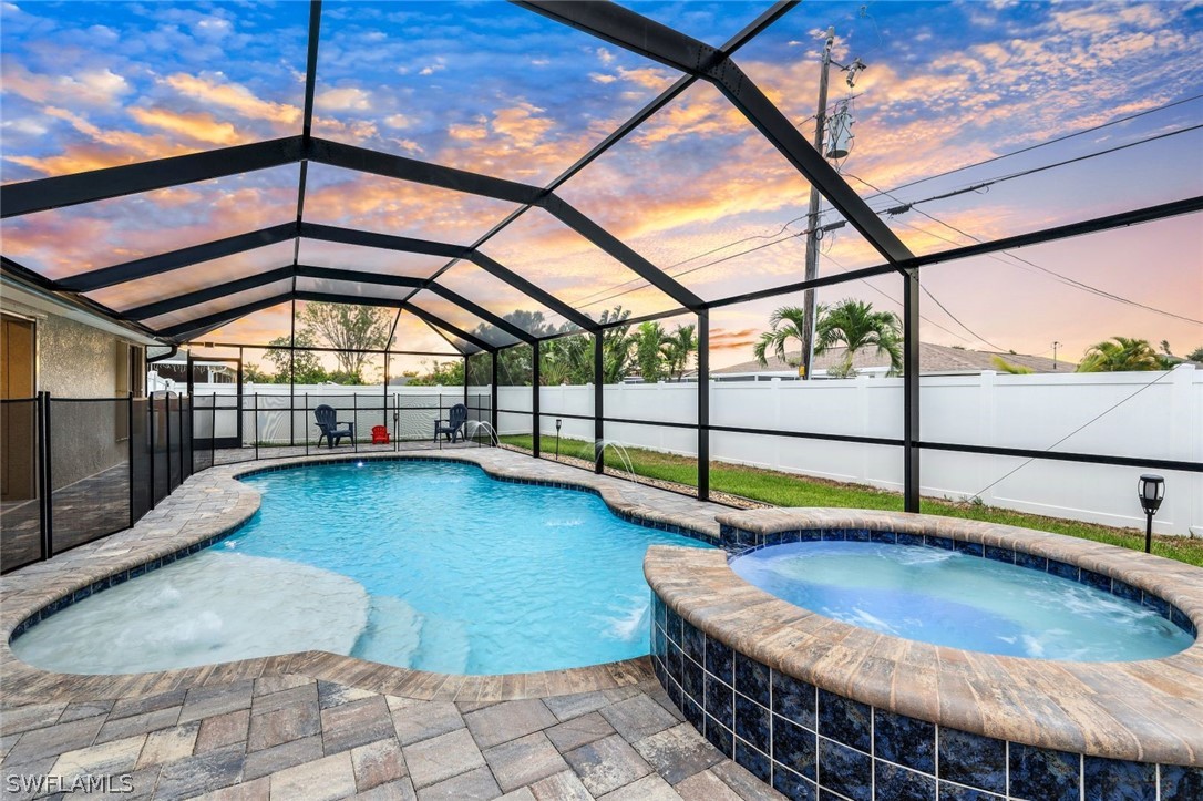 a view of a swimming pool with a porch