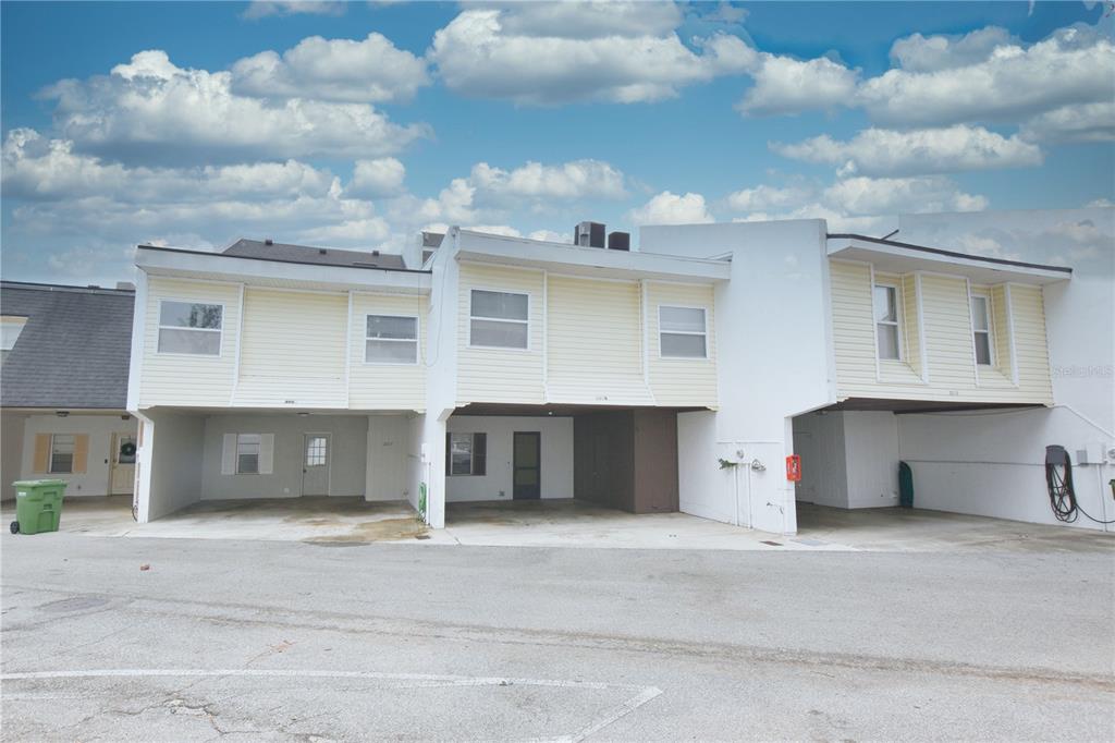 a front view of a house with a garage