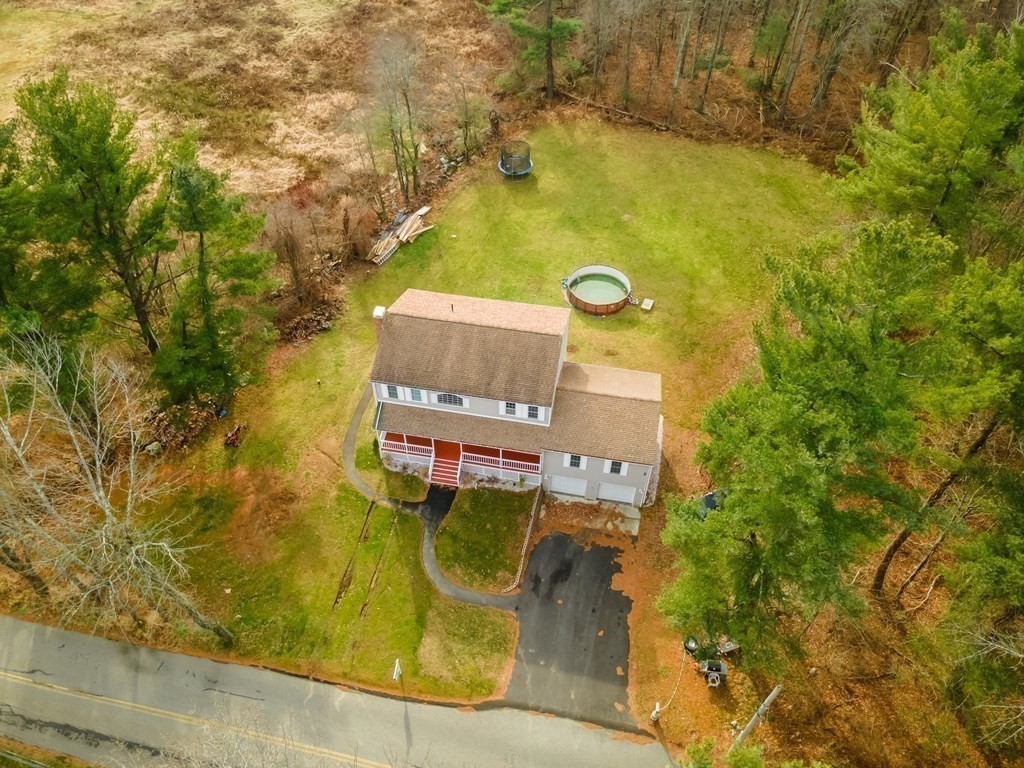 view of a house with a yard