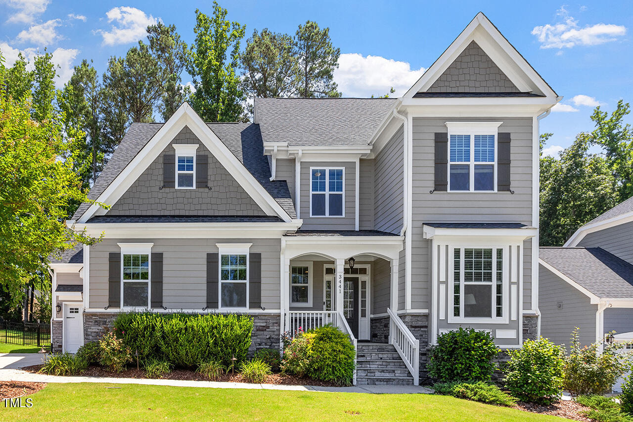 front view of a house with a yard