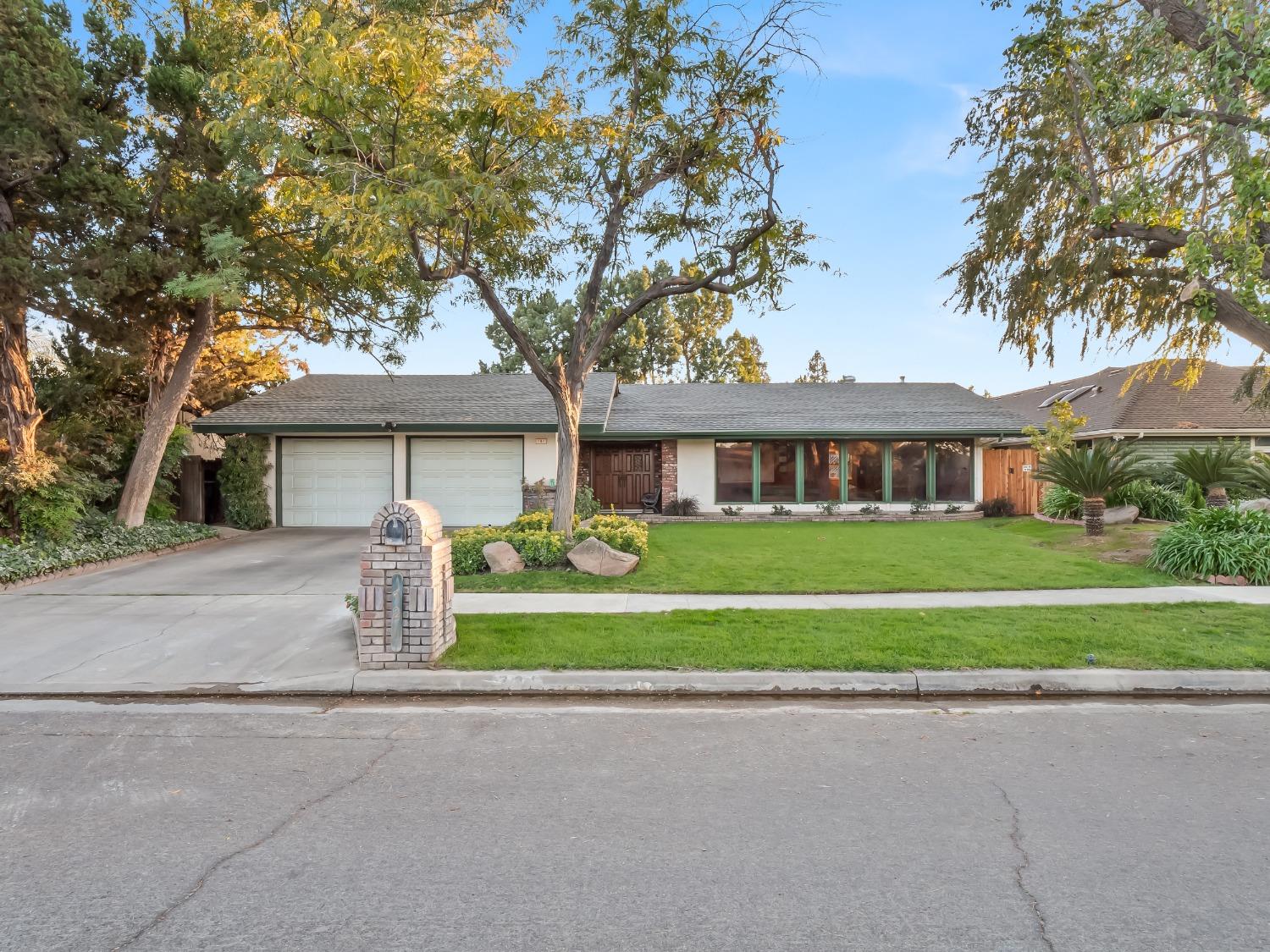 front view of a house and a yard