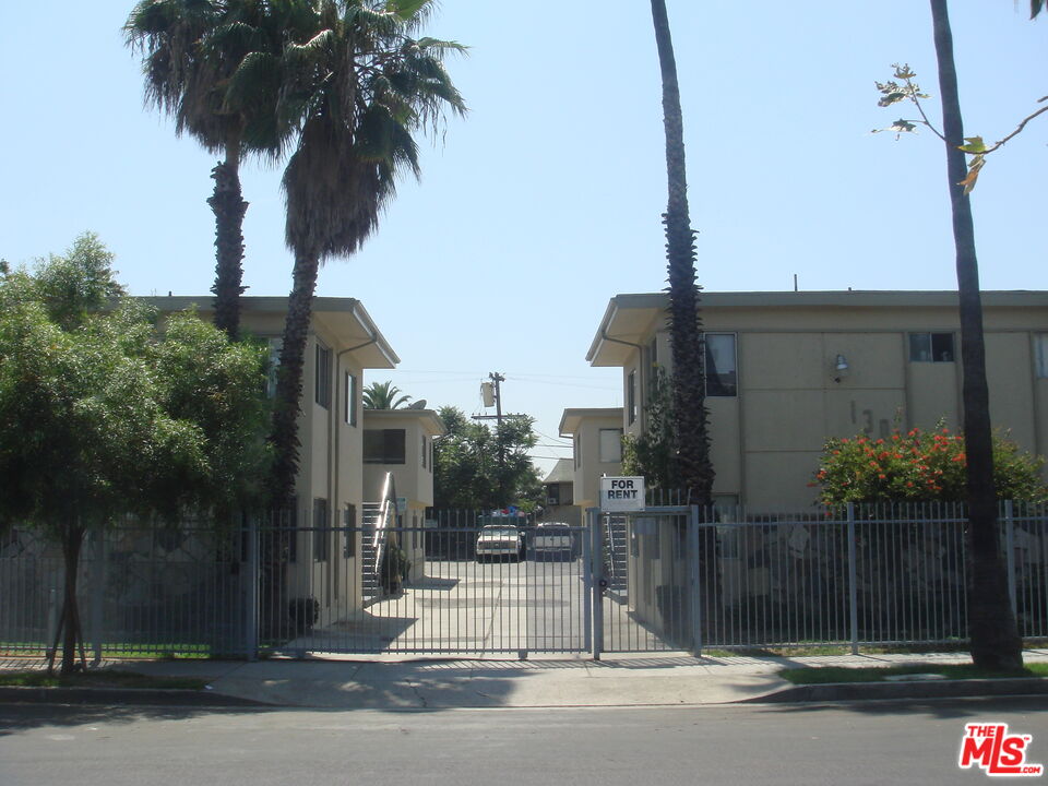 a view of path along with house and trees