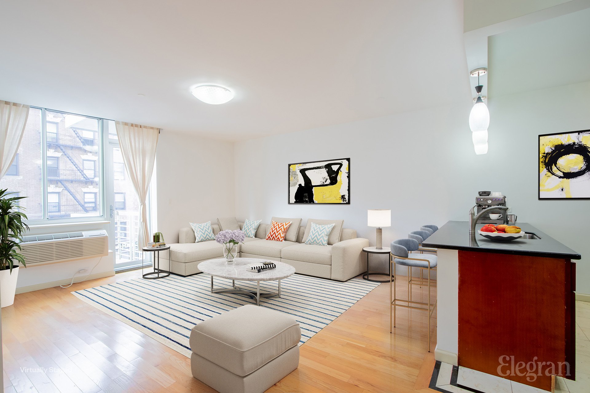 a living room with furniture and a window