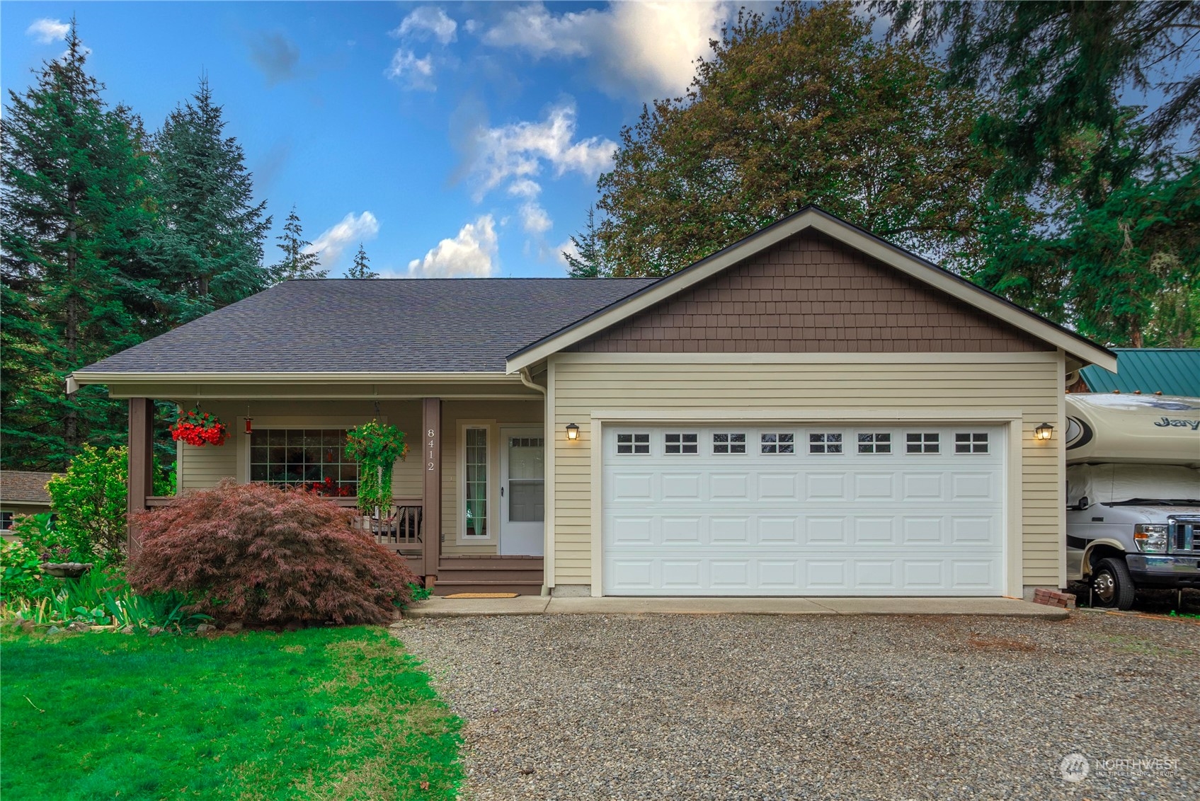 a view of front of house with a yard