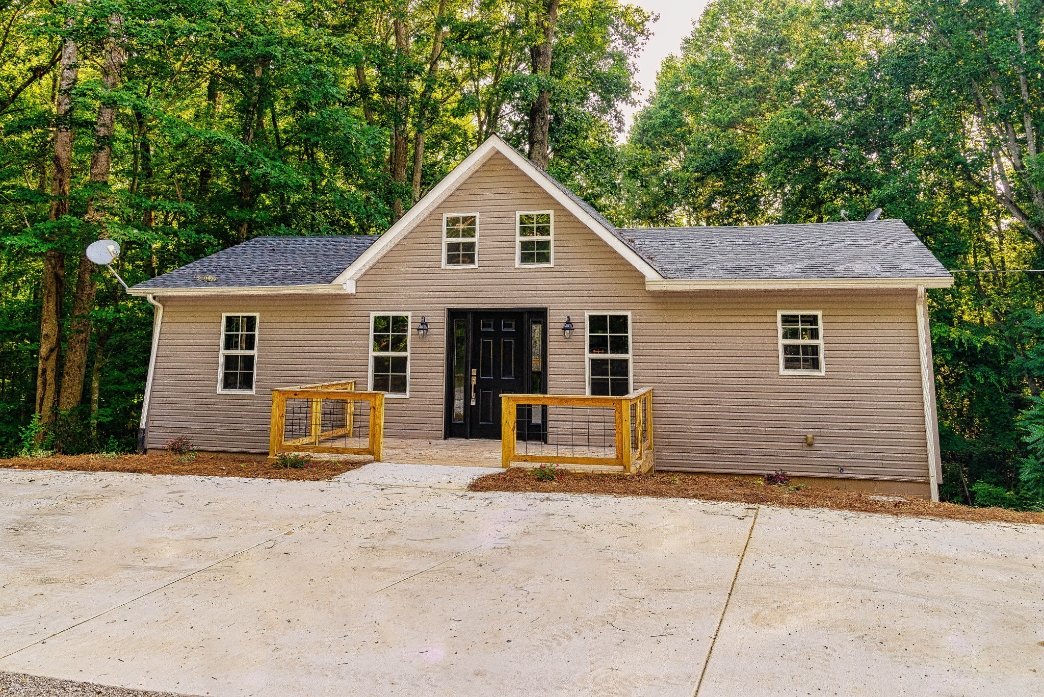 a front view of a house with a garage