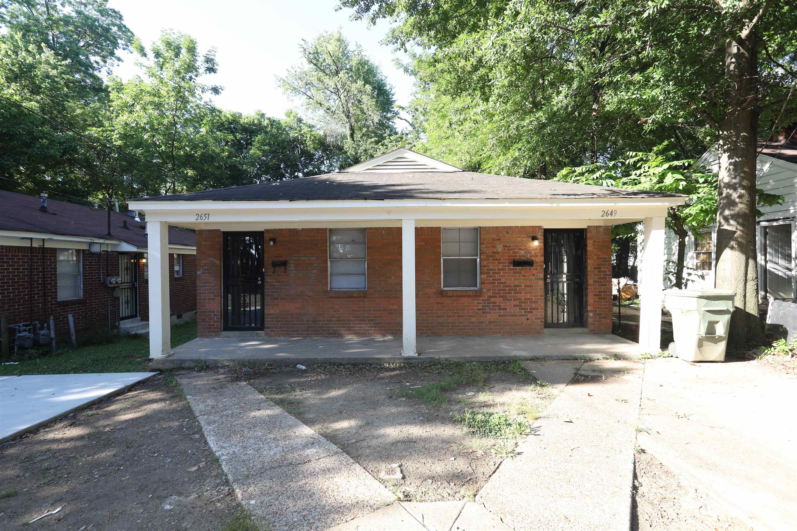 a front view of a house with a porch