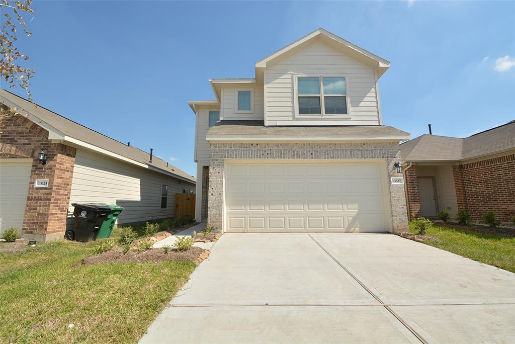 a front view of house with yard